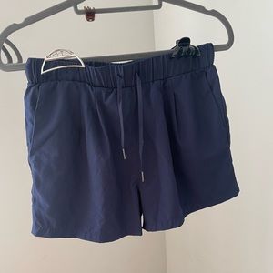 Halara navy blue shorts with pockets and draw string.